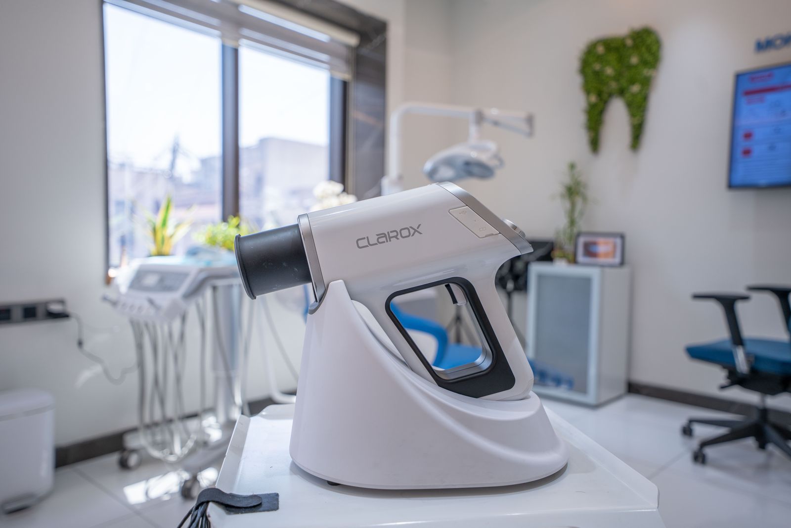 A Clarox handheld dental X-ray unit